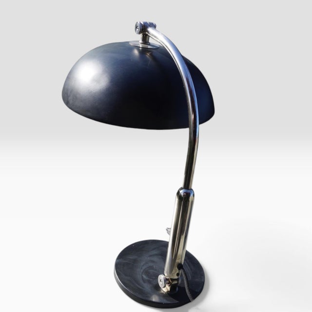 This desk lamp by Hala Zeist, model 144, was made in the Netherlands in the 1950s. It is finished entirely in black,...