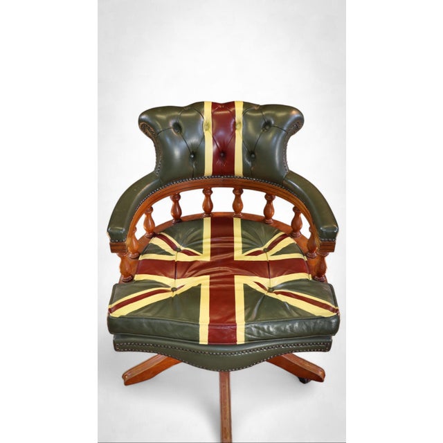 Up for grabs here is a stunning and rare captains swivel armchair in leather with a union jack pattern. This is a...