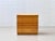 A simple chest of drawers made of solid pine with a clean, scandinavian-inspired design and a warm wood tone. The...