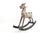 A carved and painted wooden rocking horse with a long neck, toothy expression, painted eyes, braided black mane and tail,...