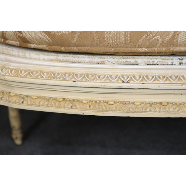 An elegant Italian Rococo French Louis XVI style settee attributed to Maison Jansen, this refined piece captures the...