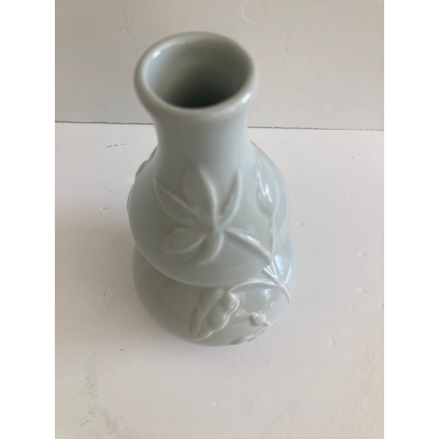 Victoria Hagan Celadon Gourd Vase with beautiful botanical designs. Gorgeous soft Celadon Green perfect as a room accent...