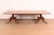 An exceptional Georgian or Regency style double pedestal extension dining table In the manner of Baker Furniture USA,...