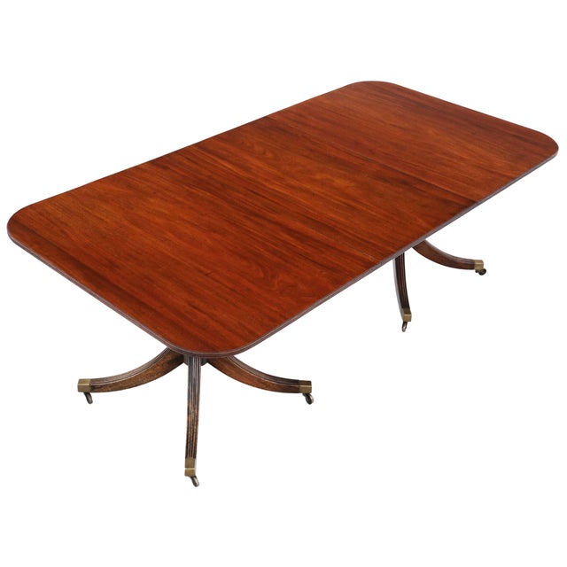Full of authentic charm and character, this fine-quality late 19th-century mahogany extending dining table offers great...