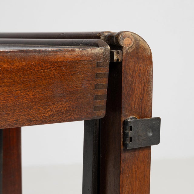 A bar cart whose dark mahogany, two-tier, castor wheels gives it real character at first glance. Dating to Early 20th...