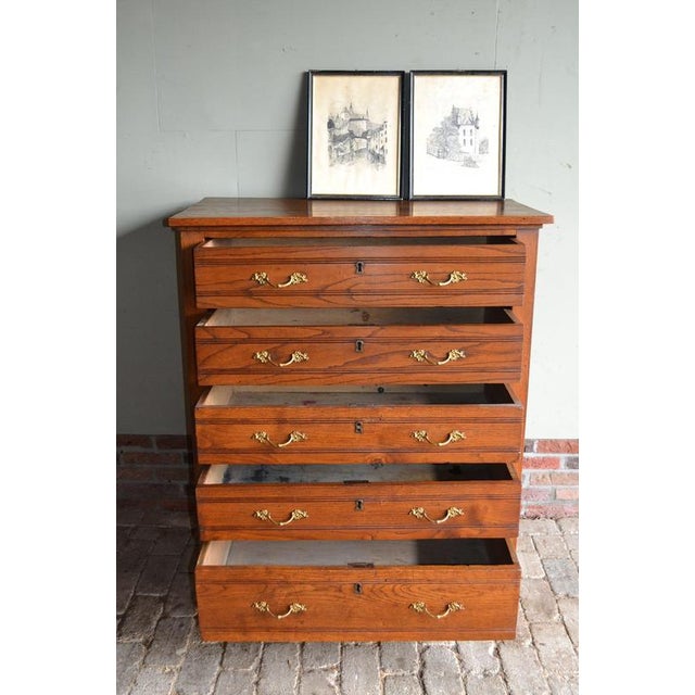 19th-century Dutch oak chest of drawers. 115 cm high, 95 cm wide, and 52 cm deep. with five drawers. from around 1900....