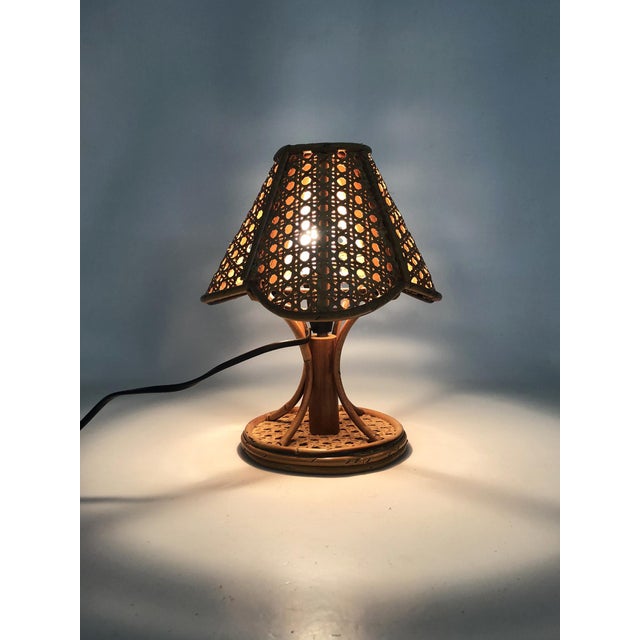 Bamboo, rattan, and cane lamp. Italy, 1950s-60s Beautiful lamp made of rattan, bamboo, and cane, crafted by artisans in...