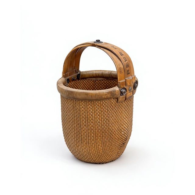 In well-aged brown color with 3 bent handles, this beautifully hand woven basket was used to carry fresh vegetables from...