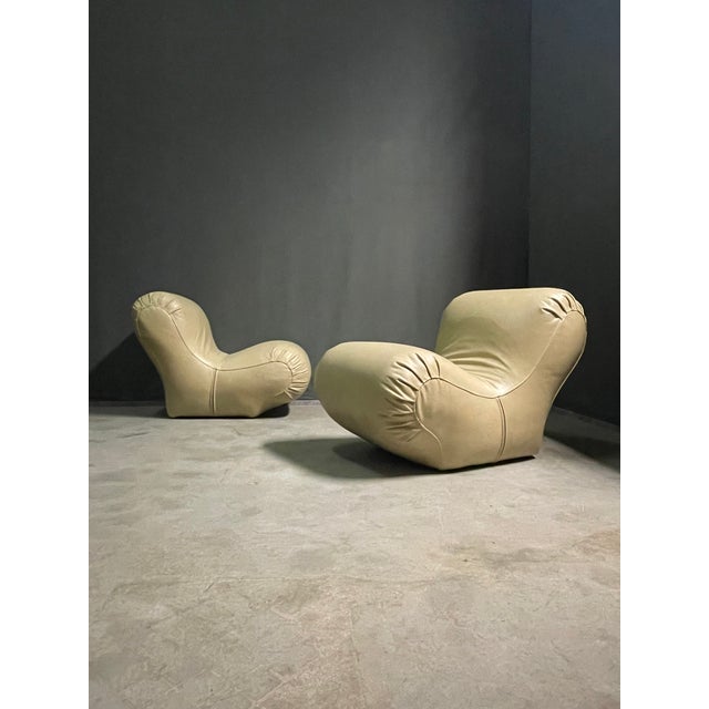 Great pair of sculptural lounge chairs upholstered in leather, France 1960/70’s. W - 50, H- 56, D- 70 cm.