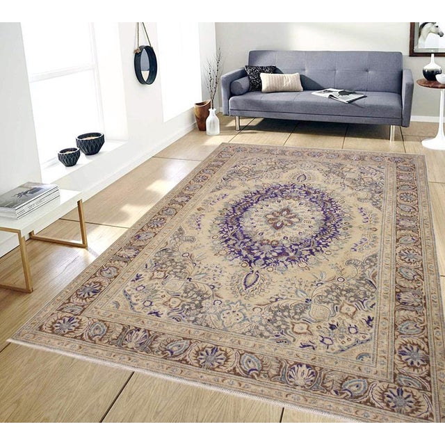Enhance your living space with this stunning vintage Persian hand-knotted wool rug, a true showstopper that effortlessly...