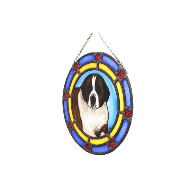 A charming Belgian Art Deco stained‑glass roundel from around 1900, featuring a finely rendered Saint Bernard dog at its...
