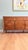 Refinished and thoroughly restored. Extra-long lowboy dresser by Very Best Furniture Co., 1965. Featuring an impressive 12...