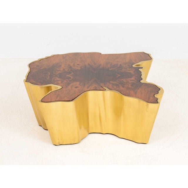 Brabbu "Sequoia" Center Table, brass bound live edge sequoia wood slab. 13.75" H x 42.75" W x 42.5" D. Provenance: From a...