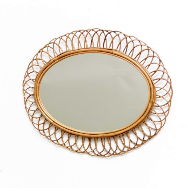 Mid-Century Modern mirror bamboo and rattan handcrafted, circa 1960 Traditionally manufactured in French. By unknown...