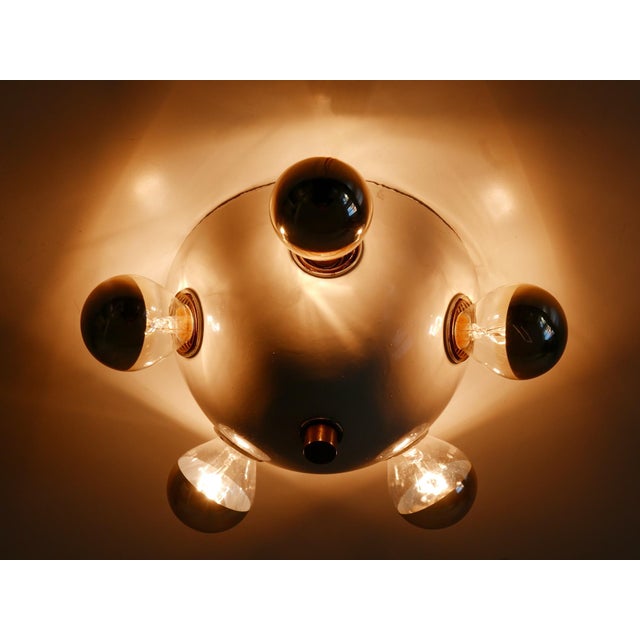 Extremely rare and highly decorative mid-century modern five-flamed sconce or ceiling lamp. Designed & manufactured in...