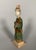 Sculpture of a Mingqi Servant, China, Ming Dynasty (1368-1644). Terracotta sculpture with green and brown glaze. Depicts a...