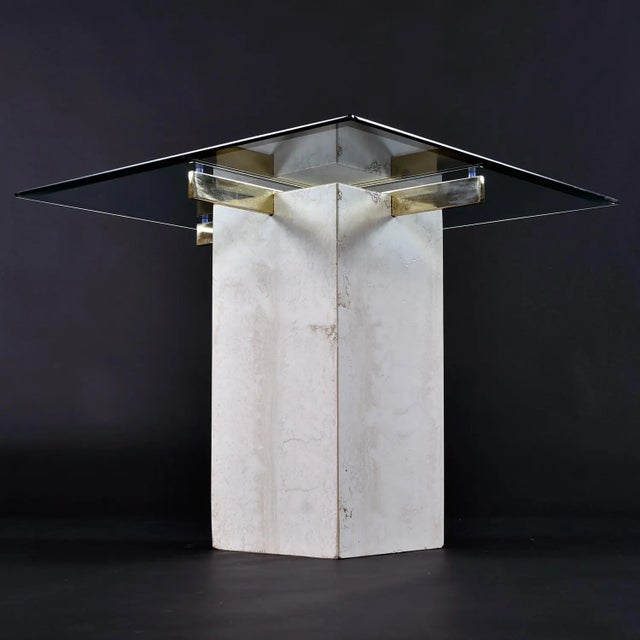 Stunning travertine stone square pedestal cocktail table in the style of Maitland-Smith. Super-sleek, elegant and Classic...