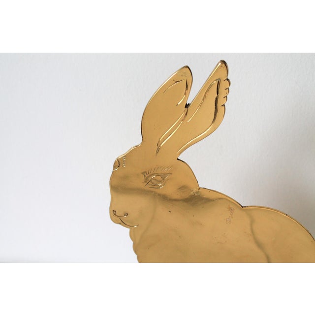 Vintage footed brass bunny rabbit candle holder. No makers mark. Some minor age wear to brass finish.