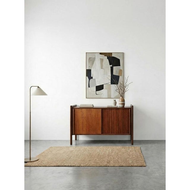 The Archimede sideboard is an icon of mid-century modern design, designed by Hirozi Fukuoh for Gavina in the 1960s....