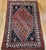 "This vintage Persian Qashqai tribal area rug, hand-knotted in Southwest Persia during the mid-20th century. The rug is...