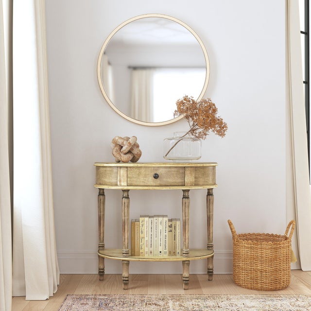 This elegant Butler Specialty Company demilune console table combines classic charm with a sleek, modern finish, making it...