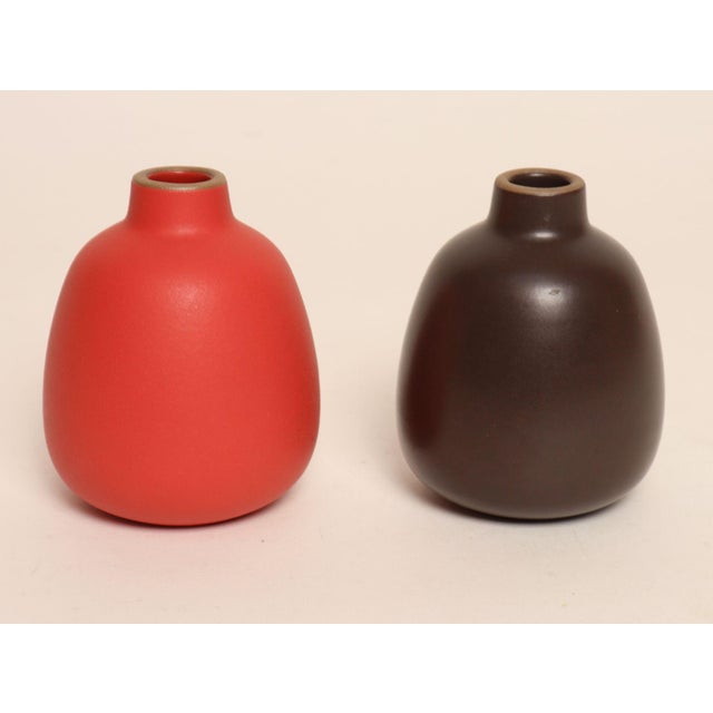 Pair of small contemporary bud vases Model #130 by Heath Ceramics of Sausalito, California, one in Dark Brown matte glaze,...
