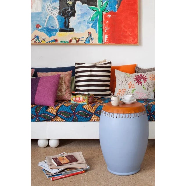 Bombo leather side table by Nestor Perkal It can also be used as a stool Dimensions: 55 x 40 x 40 cm Enamelled stoneware...