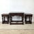 This vintage set of three nesting tables reflects the enduring appeal of Tudor and Jacobean revival design, rendered in a...
