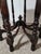 This Victorian parlor table is hand-crafted from walnut with a curved octagonal top and hand-turned legs, dating to...