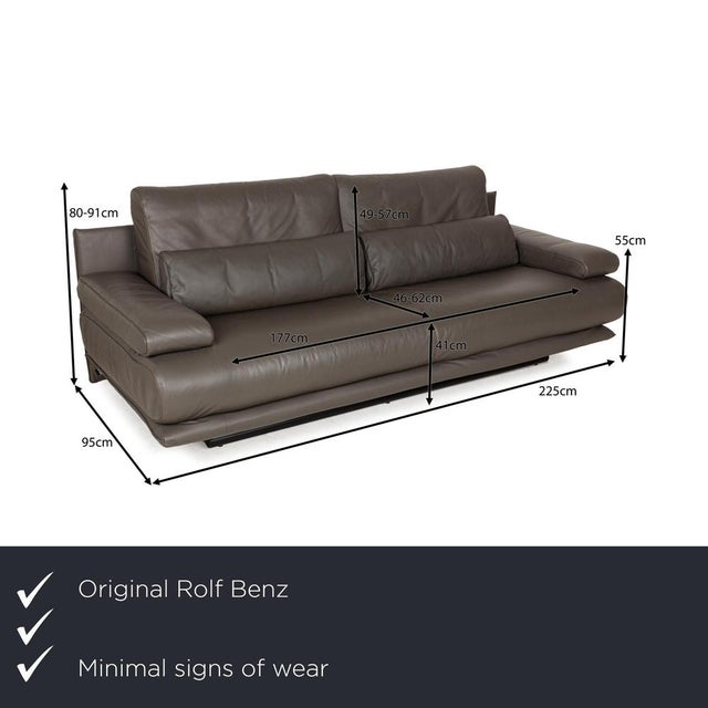 &nbsp;The 6500 sofa by Rolf Benz is covered in brown genuine leather and stands on a long, round base. The classic design...