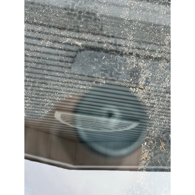 Pedestal W 19.5 x 19.5 H28.75 A striking and substantial side table featuring a thick beveled glass top resting on four...