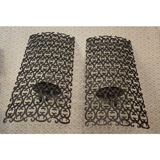 Vintage Mid Century Metal and Iron Wall Mount Pillar Candle Holder Set. Unique design with curved backs. Bronze or brown....