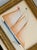 Hand-painted by master artists using acrylic paints and natural pigments, this sailboat pairs softly shaded peach and...