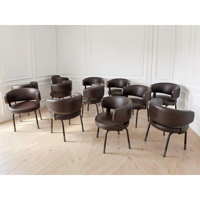 Splendid set of 12 office or home chairs designed by Gianni Moscatelli, produced by Formanova in 1960. Iron frame, partly...