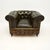 A large and very impressive antique Victorian leather Chesterfield armchair. This was made in England, we would date it to...