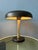 Beautiful original black bauhaus table lamp from the 30s. The lamp has a robust appeal. The lamp is fully made out metal...