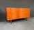 Timeless Danish modern teak credenza designed by Poul Hundevad, circa 1960s. Crafted from beautiful teak, featuring...