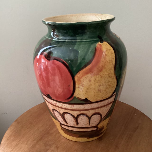 This vintage ceramic vase hand-painted by Bellini Piu Art Studio in Italy features a unique design handcrafted with a...