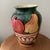 This vintage ceramic vase hand-painted by Bellini Piu Art Studio in Italy features a unique design handcrafted with a...