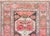 A remarkable early 20th century Persian Kazak rug with the most wonderful floral medallions running the length of the rug,...