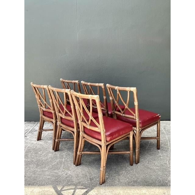 This sophisticated set of six dining chairs by the legendary McGuire Furniture Company of San Francisco represents the...