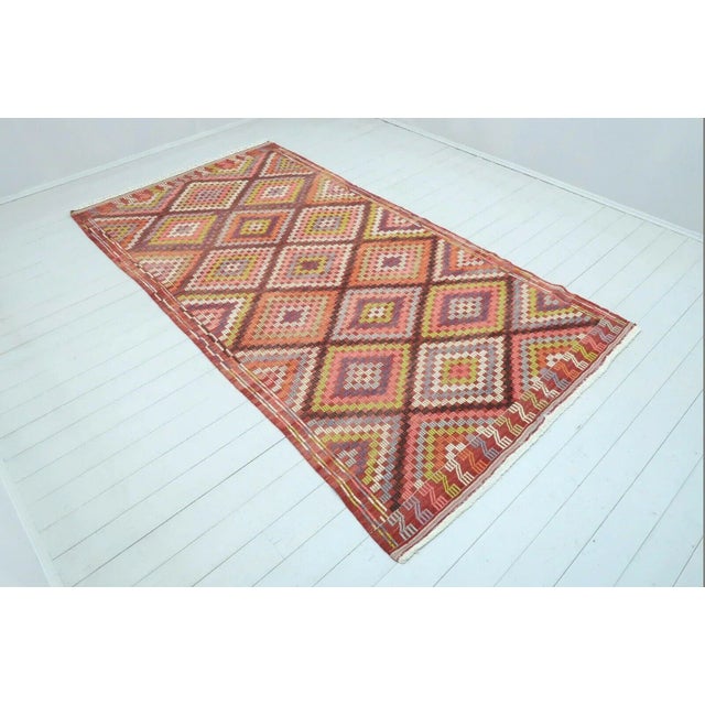 This beautiful, vintage, handwoven Kilim is approximately 60 years old. It is handmade, of very fine quality hand spun...