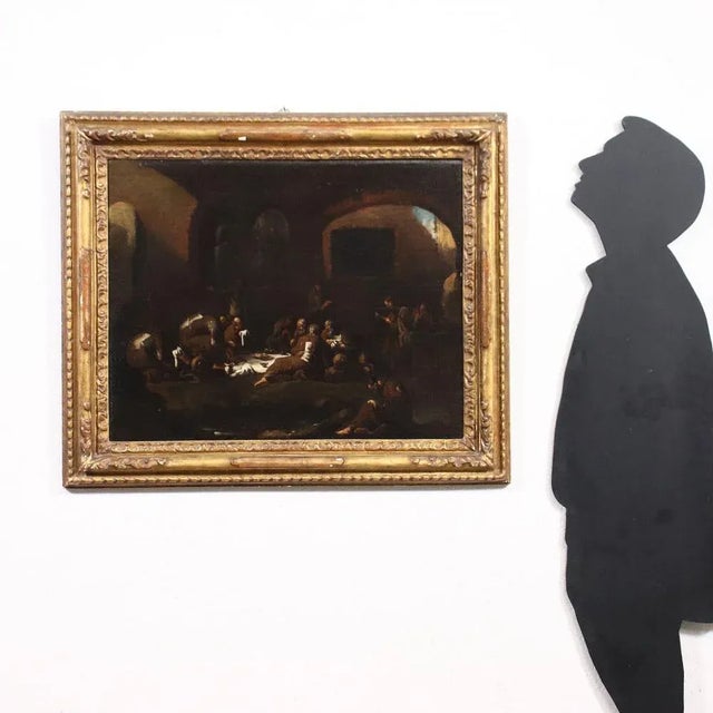 Oil on canvas. Genoese school of the eighteenth century. Inside a large room with arched windows opening onto the street,...