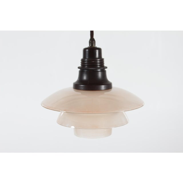 Original vintage Poul Henningsen (1894–1967) PH 2/2 pendant light made in the 1930s. The shades are made of sandblasted...