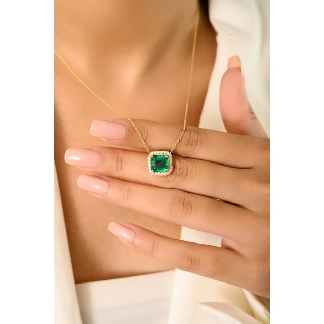 2.52 Carat Square Cut Emerald Chain Necklace with Diamond Halo beautifully crafted in 14k Yellow Gold. Surrounding the...