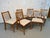 Beautiful set of six mid-century modern dining chairs featuring warm-toned solid wood frames and clean, timeless lines....