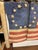 1960’s Folk Art Flag Waving on Stand For Sale - Image 4 of 12