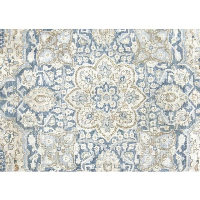 1940s Persian Tabriz Rug. Hand woven in the Tabriz region of Northern Iran. Distressed and refinished in the U.S. These...