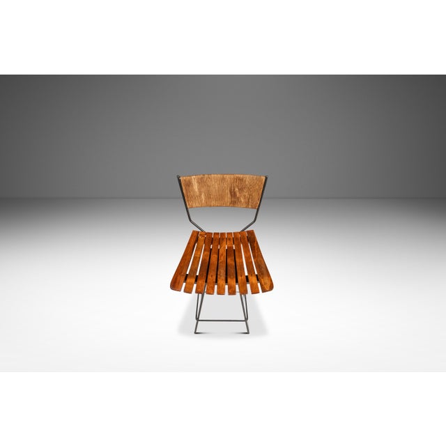 This rare set of three Arthur Umanoff bar stools for Raymor captures the casual sophistication and organic modernism that...