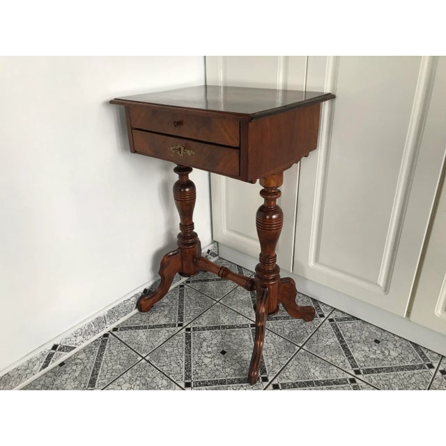 Renovated table with drawers from around 1900 An antique coffee table, once intended for storing sewing materials. Made at...